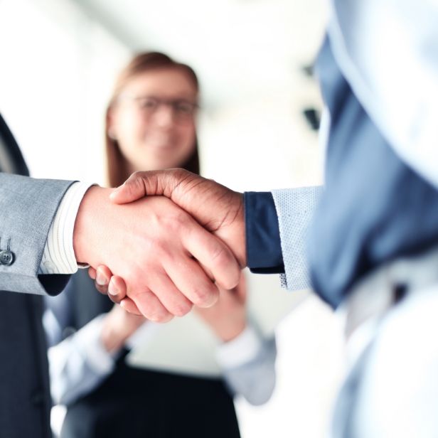 people shaking hands -partnerships hero